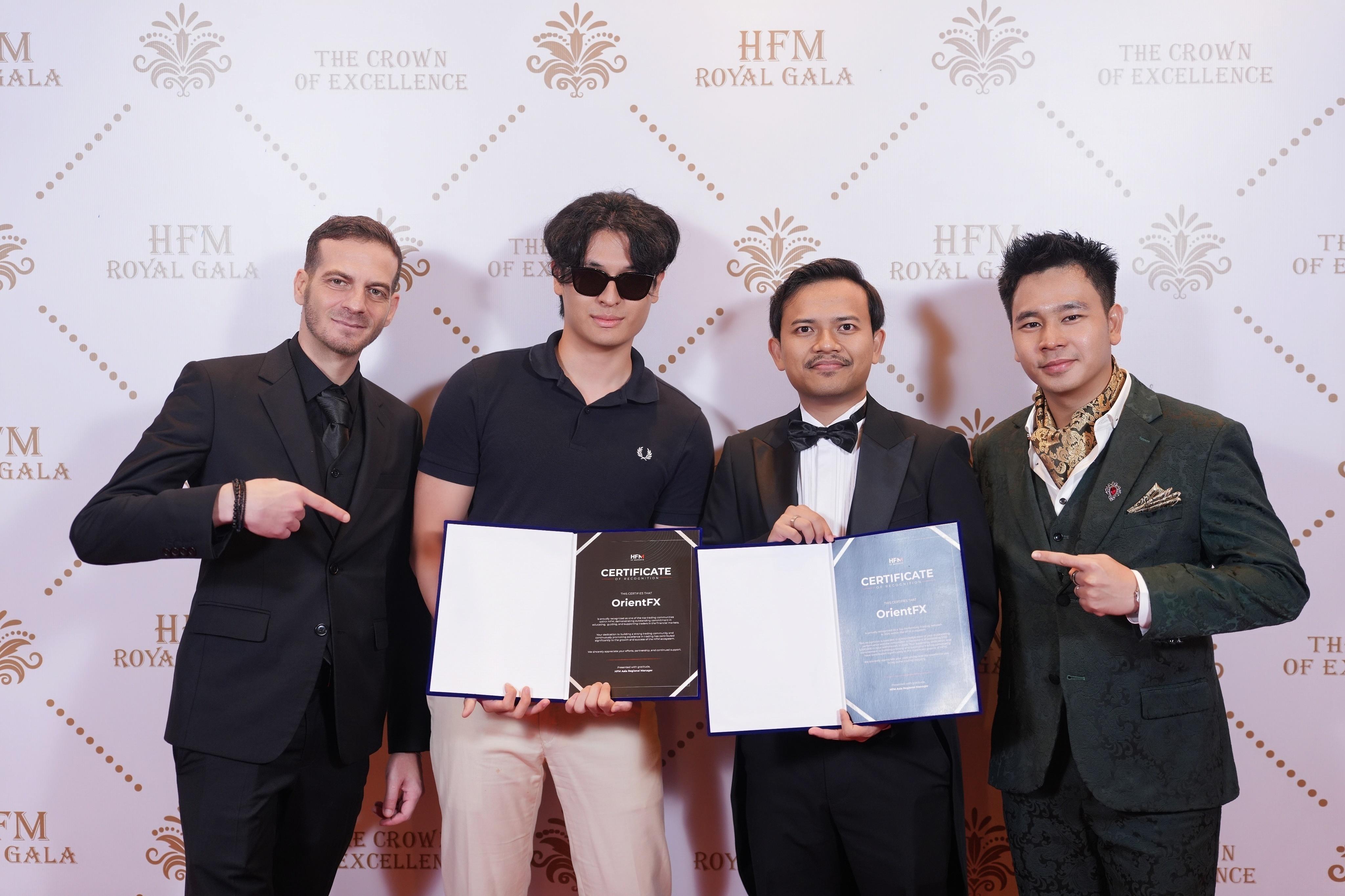 Jay receiving HFM Crown of Excellence — OrientFX Top Trading Community 2025